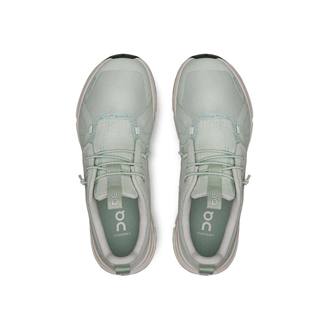 Top-down view of sage green On Running Cloud Sky youth sneakers with breathable mesh and speed-lacing system.