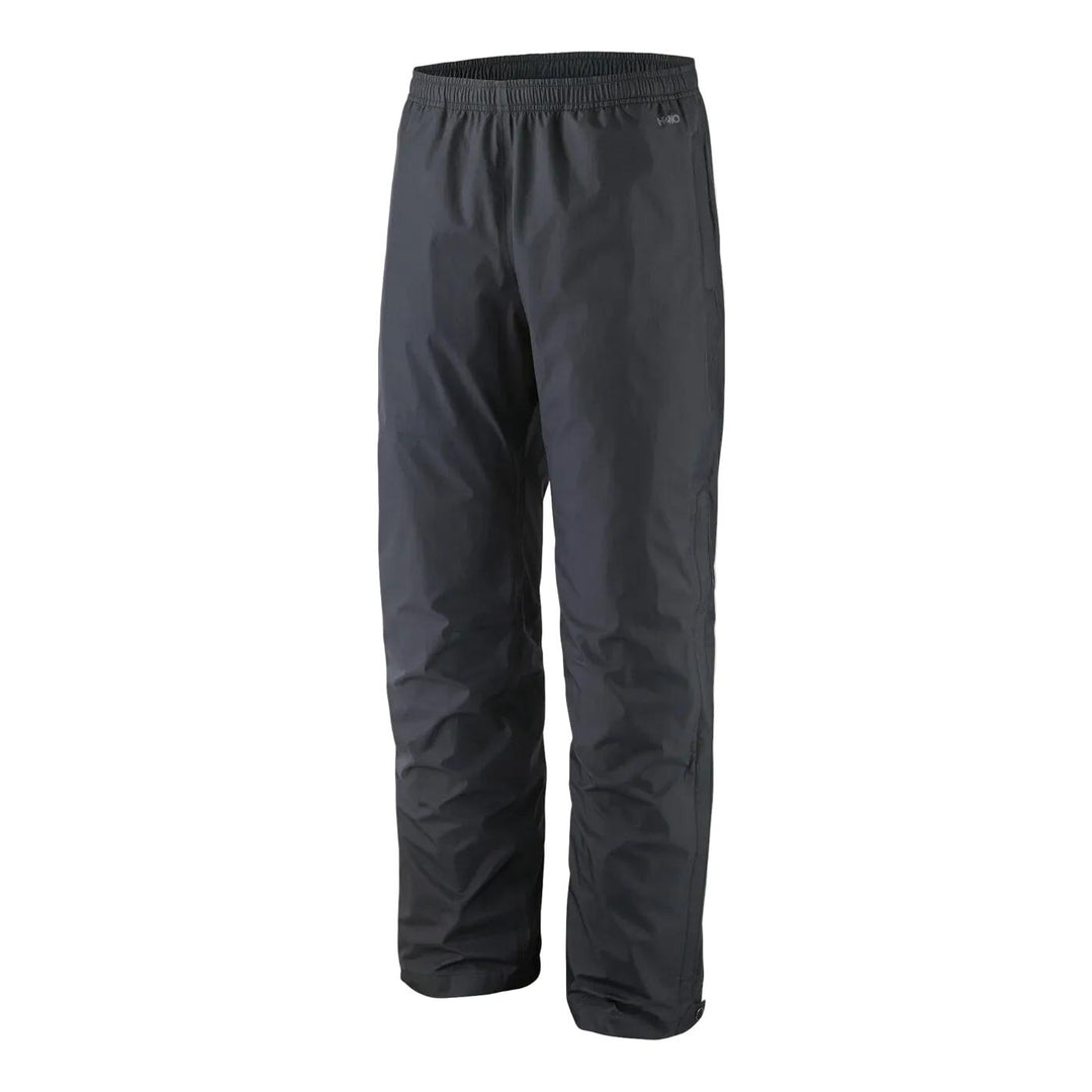 Black Patagonia Torrentshell 3L waterproof rain pants with an elastic waistband and side-zip construction.