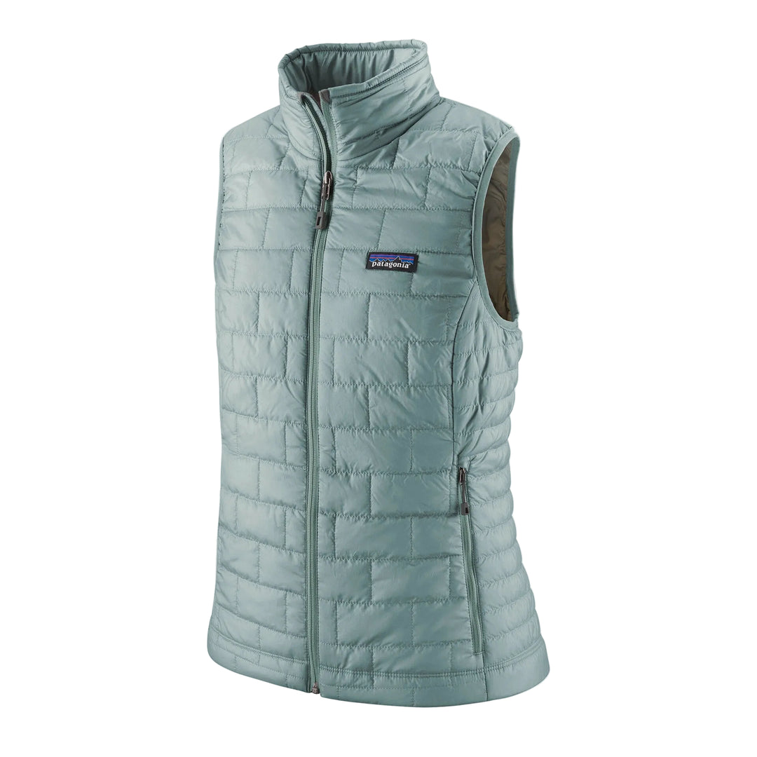 Sage green Patagonia Nano Puff vest with brick quilting, full-zip front, and zippered handwarmer pockets.