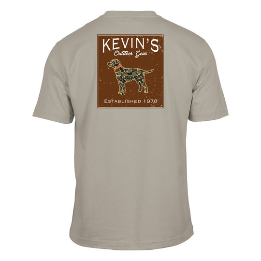 Tan Comfort Colors short sleeve t-shirt featuring a back graphic of a camo labrador and Kevin's Outdoor Gear logo.