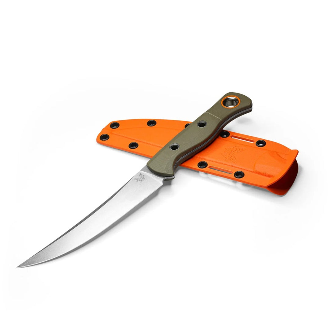 Benchmade Meatcrafter hunting knife with olive handle and orange sheath on a white background.