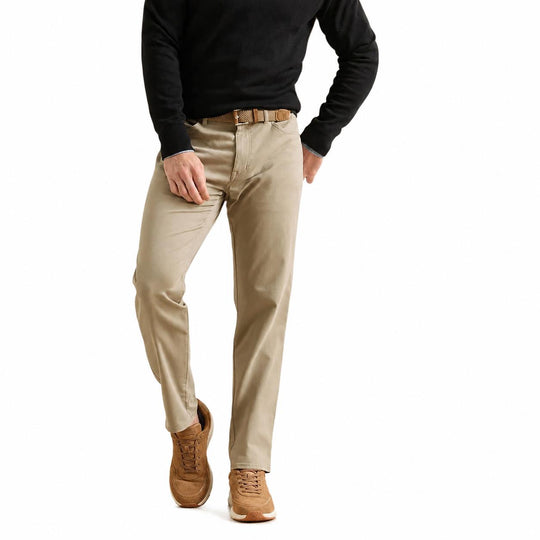 Peter Millar men's khaki sateen five-pocket pants in a classic fit with a comfortable waistband and soft cotton blend.