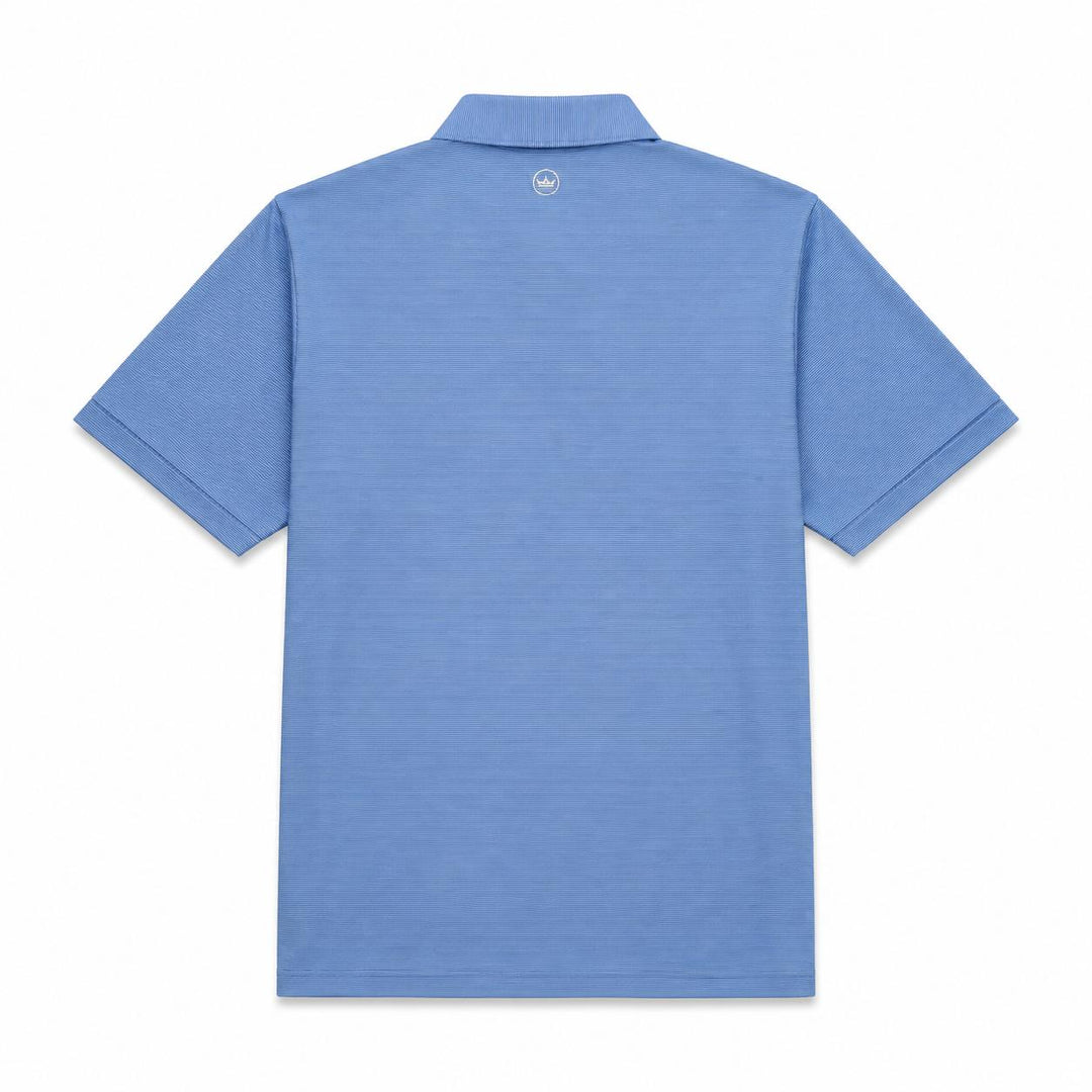 Back view of a blue Peter Millar performance jersey polo with a self-fabric collar and small crown logo at the neck.