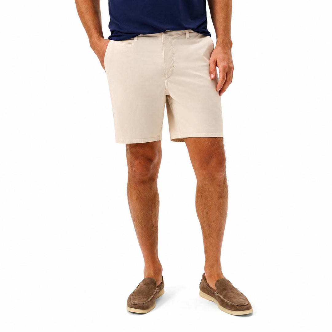 Beige Johnnie-O Nassau garment-dyed stretch cotton shorts with a 7-inch inseam and tailored fit.