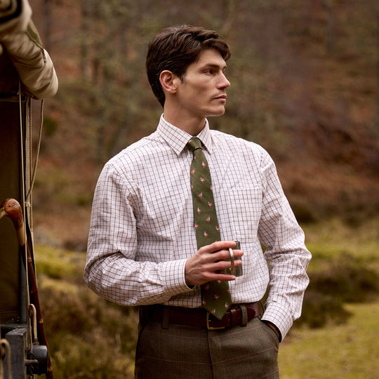 Man wearing a Schoffel Burnham classic fit tattersall shirt in soft cotton twill with a crisp collar and long sleeves.