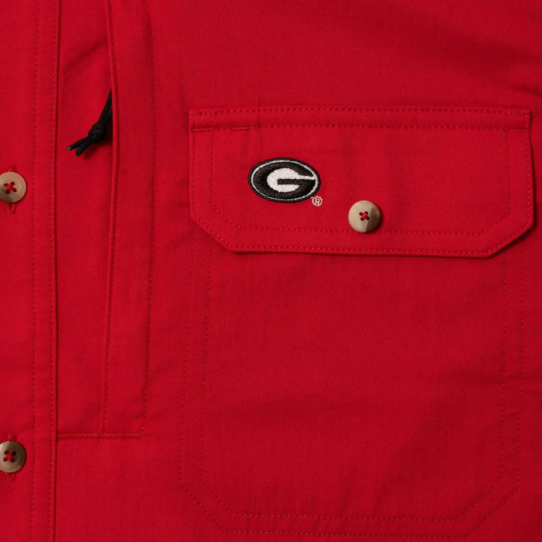 Red University of Georgia performance shirt featuring a chest pocket with the official G logo and button closure.