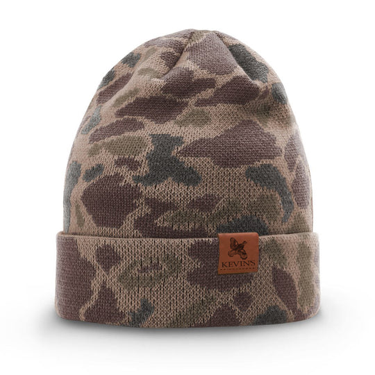 Kevin's duck camo knitted beanie with a double-layer jacquard construction and a brown leather logo patch.