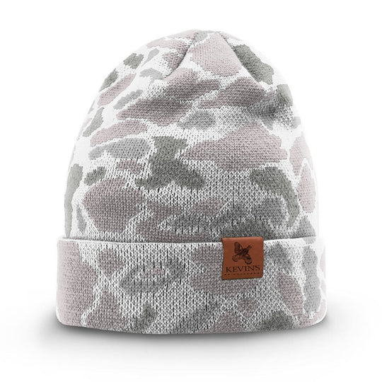 Kevin's duck camo knitted beanie in white and grey with a brown leather logo patch on the cuffed brim.
