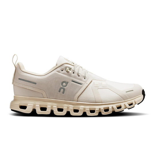 Beige On Running Cloud 6 waterproof women's sneaker with a mesh upper, speed-lacing system, and cushioned CloudTec sole.