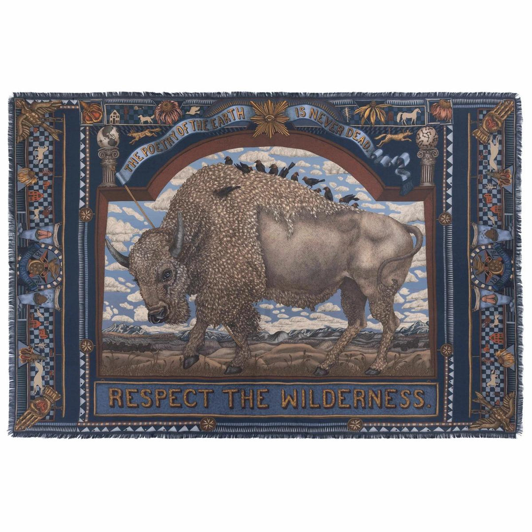 Navy blue silk rectangle scarf featuring a detailed American bison illustration with folk art motifs and fringed edges.