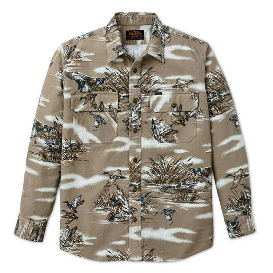 Tan Filson field flannel shirt featuring a duck hunting print, button-front closure, and dual chest pockets.