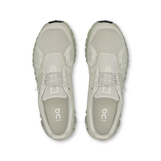 Top-down view of light beige On Running Cloud 6 men's sneakers featuring breathable mesh and speed lacing system.
