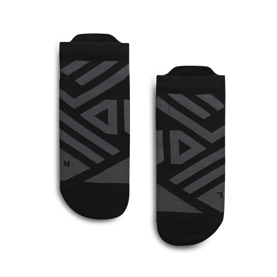 On Running women's black low-cut performance running socks with grey arch support panels and left/right labeling.