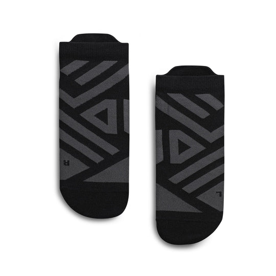 On Running women's black low-cut performance running socks with grey arch support panels and left/right labeling.