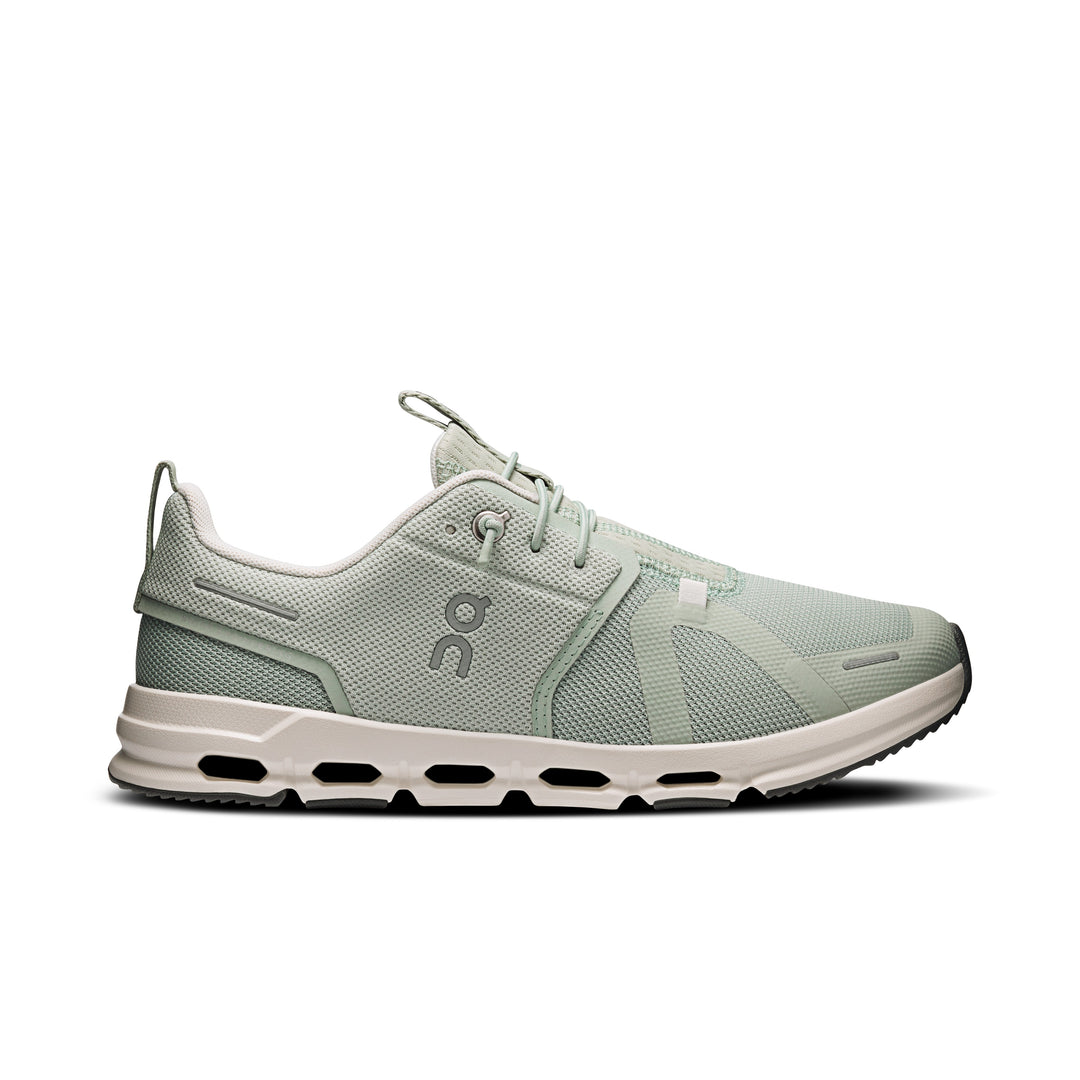 Sage green On Running Cloud Sky youth sneaker with breathable mesh upper, speed lacing, and cushioned CloudTec sole.