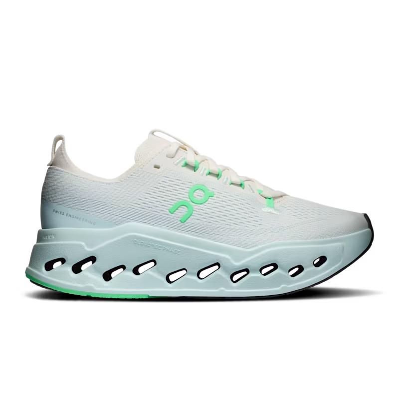 On Running Women's Cloudsurfer Max in white with mint green accents, featuring a thick CloudTec Phase cushioned sole.