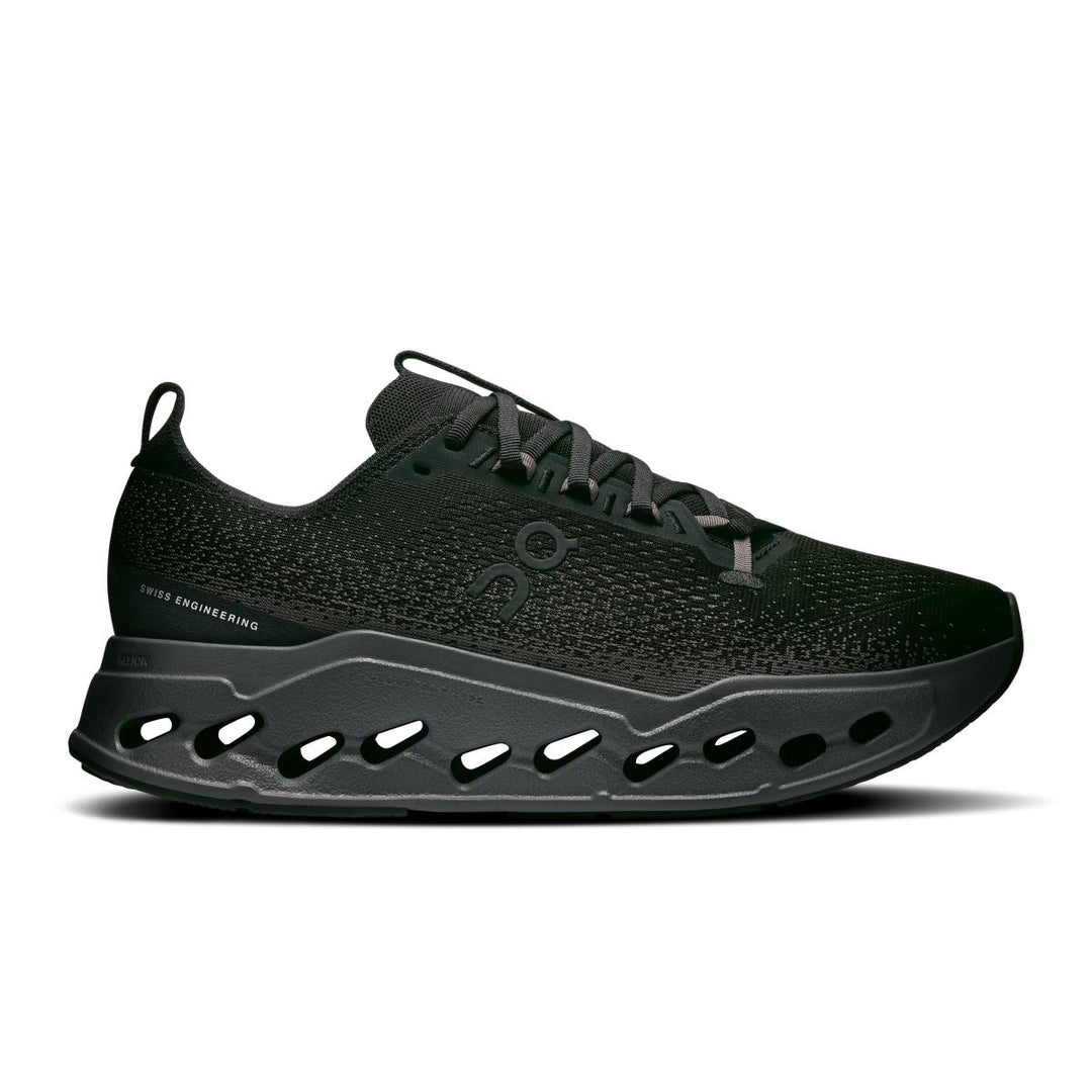 All-black On Running Cloudsurfer Max with a thick, cushioned CloudTec Phase sole and breathable sock-like mesh upper.