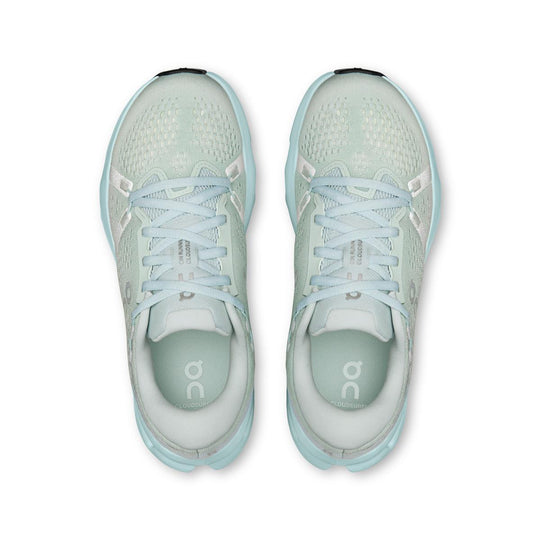 Top view of light mint green On Running Women's Cloudsurfer 2 sneakers with breathable mesh and cushioned soles.
