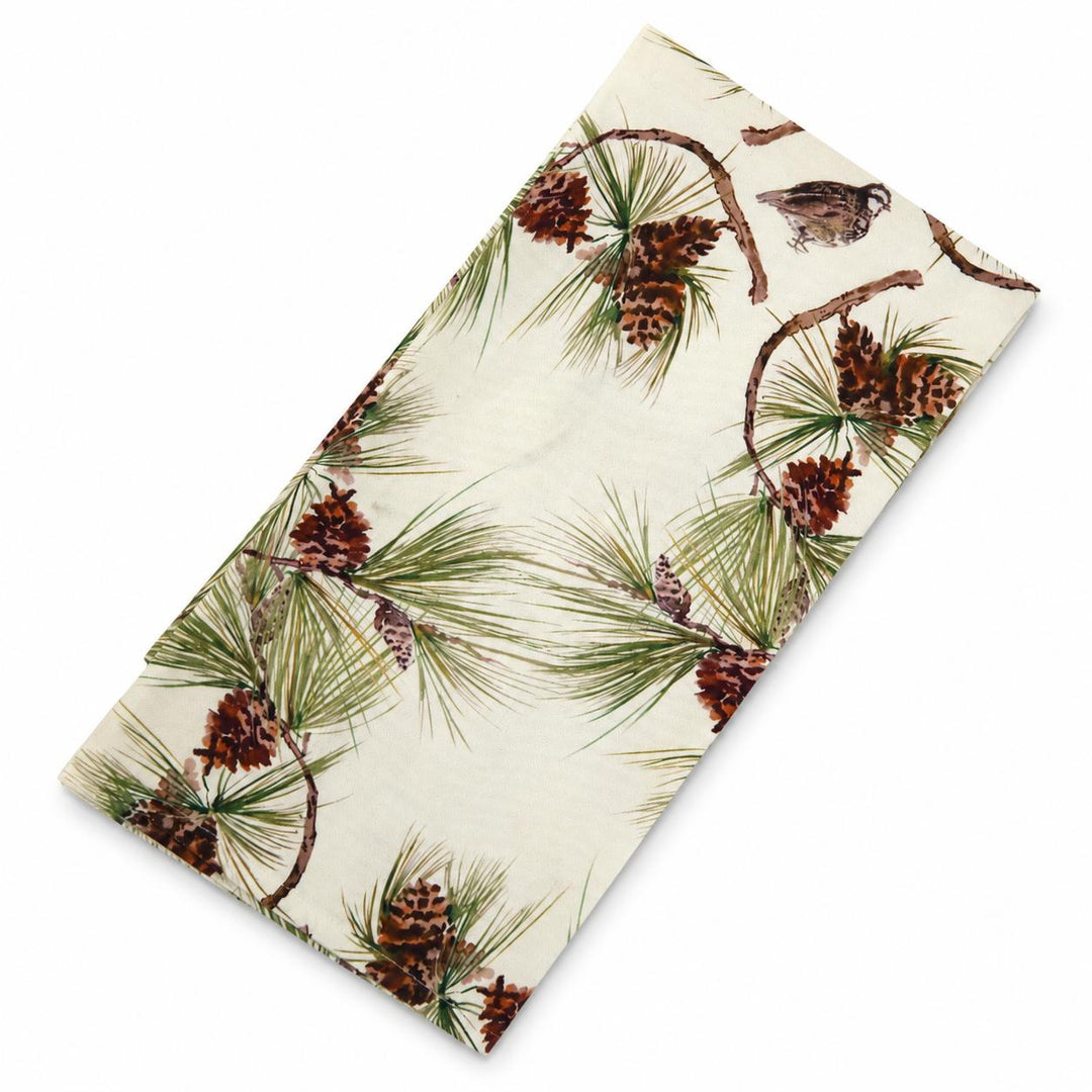 Soft cotton canvas napkin featuring a watercolor print of Bobwhite quail and longleaf pine cones on a cream background.