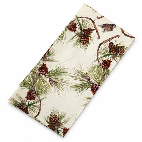 Soft cotton canvas napkin featuring a watercolor print of Bobwhite quail and longleaf pine cones on a cream background.