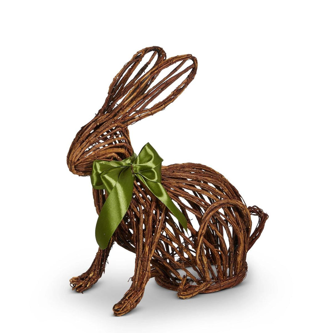 Handcrafted rabbit figurine made of rustic brown woven twigs with a decorative green satin ribbon bow.