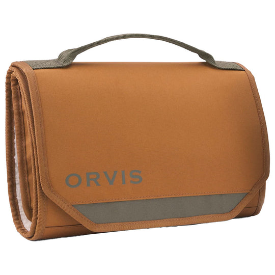 Brown Orvis upland gun cleaning kit in a compact, rolled CORDURA polyester design with a sturdy carry handle.