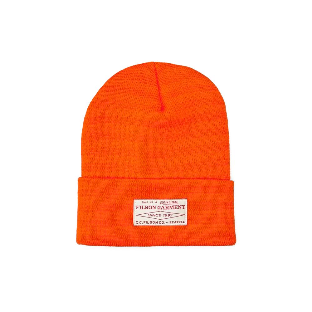 Bright orange Filson Ballard watch cap in 100% acrylic knit with a cuffed design and a branded Filson patch.