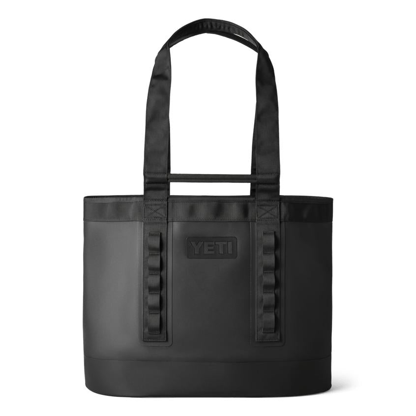 Black YETI Camino 50 Carryall tote bag made of waterproof, durable material with sturdy shoulder straps and gear loops.
