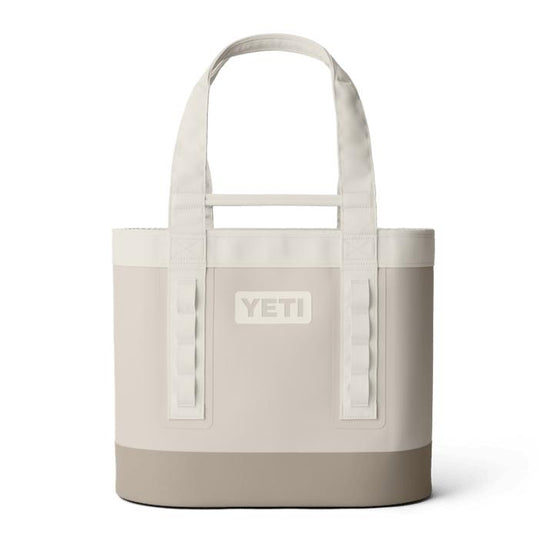YETI Camino Carryall 35 tote in light beige, featuring durable waterproof material, sturdy shoulder straps, and gear loops.