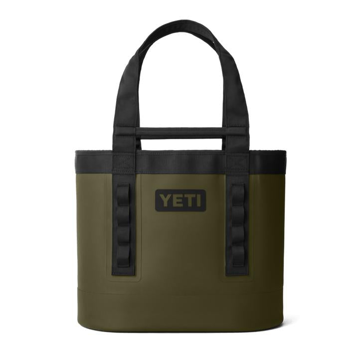 Olive green YETI Camino Carryall 35 waterproof tote bag with black handles, rugged base, and gear loops on a white background.