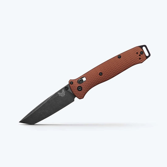 Benchmade Bailout folding knife with a black tanto blade and textured brown Grivory handle on a white background.