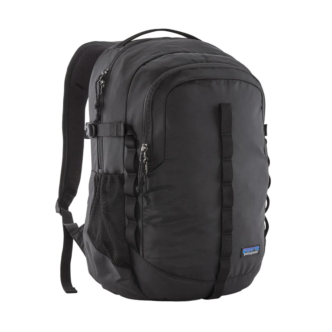 Black Patagonia Refugio 26L daypack with recycled polyester fabric, mesh side pockets, and front gear loops.