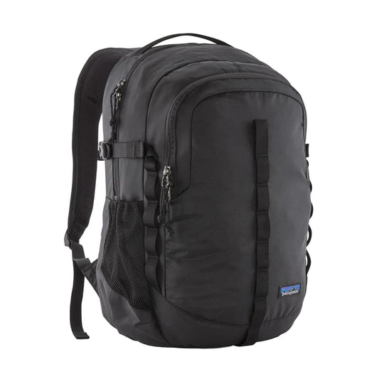 Black Patagonia Refugio 26L daypack with recycled polyester fabric, mesh side pockets, and front gear loops.