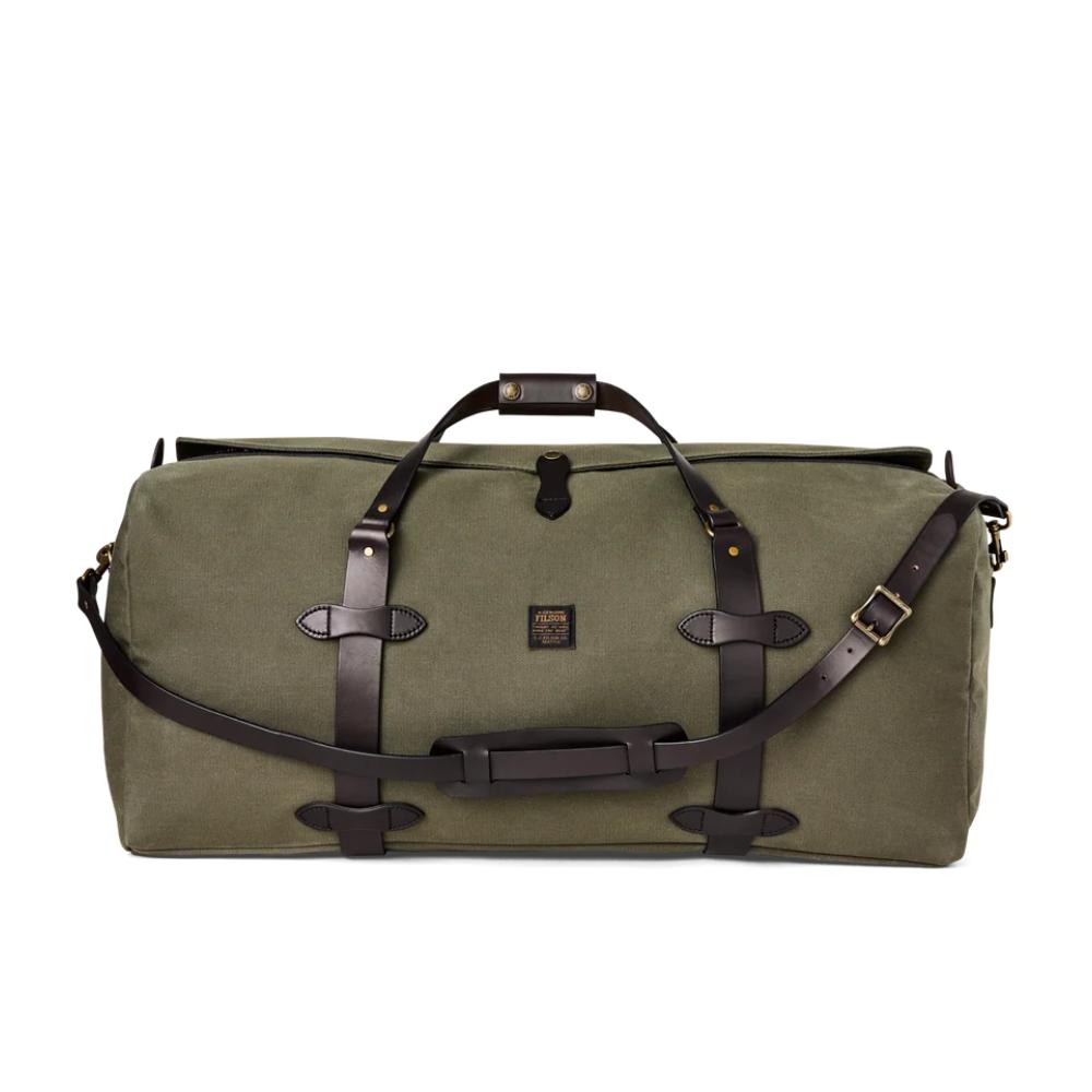 Olive green Filson large duffle bag in rugged twill with dark brown bridle leather straps and brass hardware.