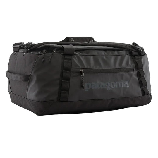 Black Patagonia Black Hole 40L duffel bag made of weather-resistant recycled ripstop with daisy chains and side pockets.