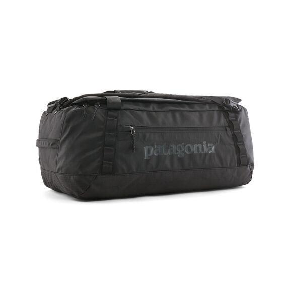 Black Patagonia Black Hole 55L duffel bag in weather-resistant ripstop fabric with side pocket and daisy chains.