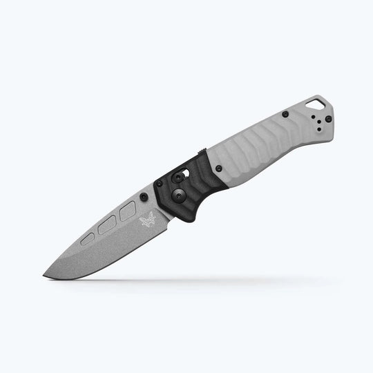 Benchmade PSK folding knife with a grey Cerakote blade, textured light grey handle, and black AXIS assist mechanism.