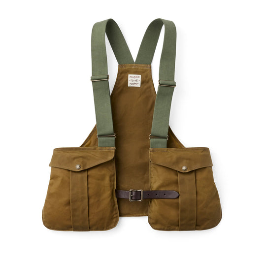 Tan Tin Cloth hunting vest with olive green webbing straps, expandable shell pockets, and a Bridle Leather waist belt.