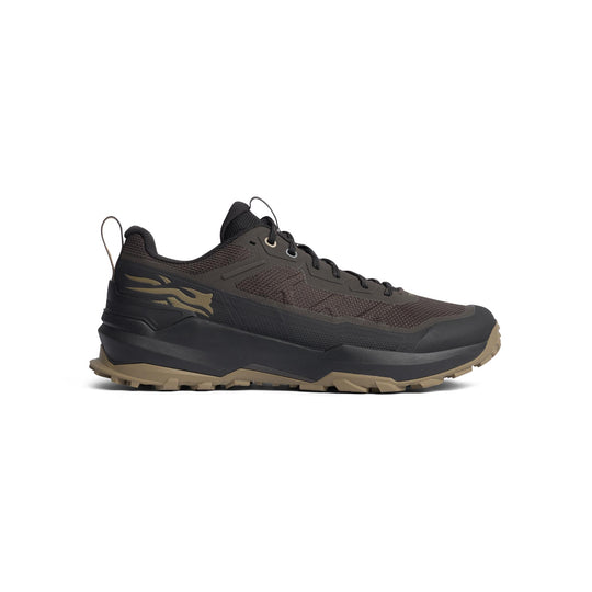 A single trail running shoe in dark brown and black with a tan outsole, shown in a side profile view against a plain white background.