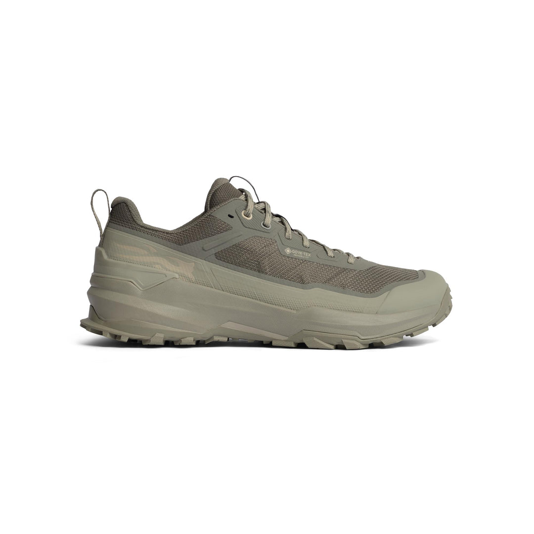 A single hiking shoe in a muted taupe-gray color, shown from the side against a plain white background.
