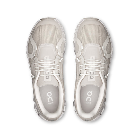 Top-down view of beige On Running Women's Cloud 6 wide sneakers with breathable mesh uppers and speed lacing system.