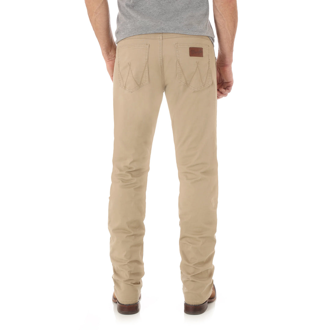 Men's slim straight fit tan twill pants with classic five-pocket styling and Wrangler back pocket stitching.