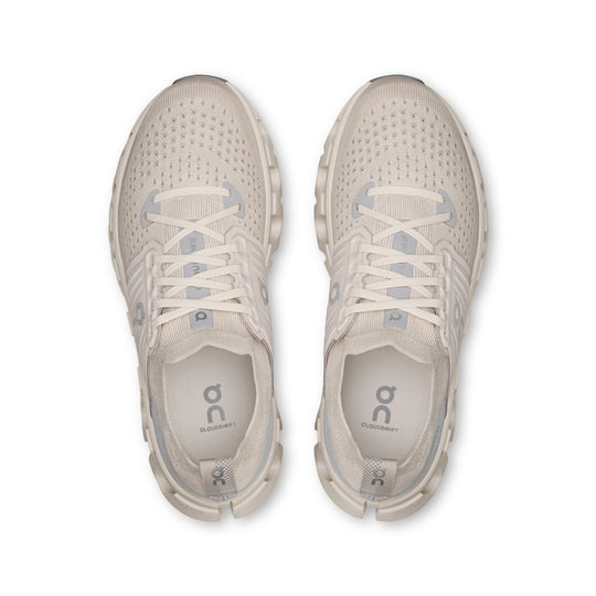 Top-down view of beige On Running Women's Cloudswift 4 shoes featuring a breathable mesh upper and supportive cage design.