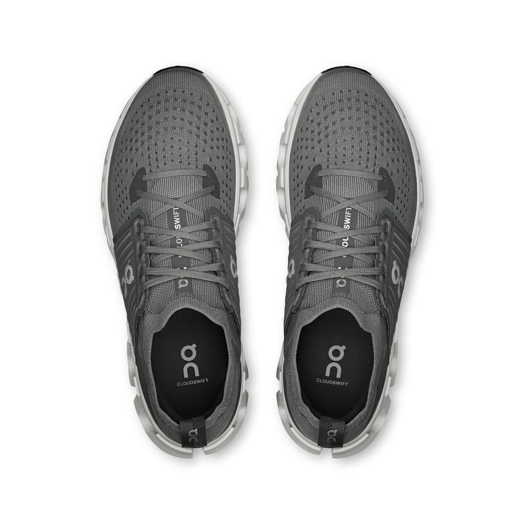 Top-down view of grey On Running Cloudswift 4 road shoes featuring a breathable mesh upper and cushioned Helion foam midsole.