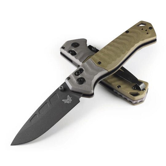 Benchmade PSK folding knife with a black Cerakote blade, grey bolster, and textured tan handle on a white background.