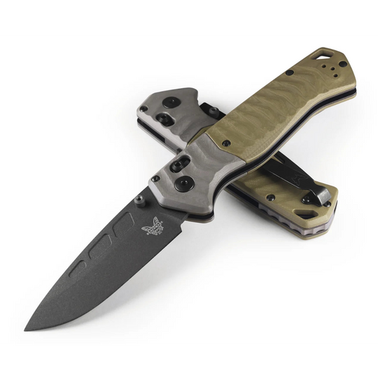 Benchmade PSK folding knife with a black Cerakote blade, grey bolster, and textured tan handle on a white background.