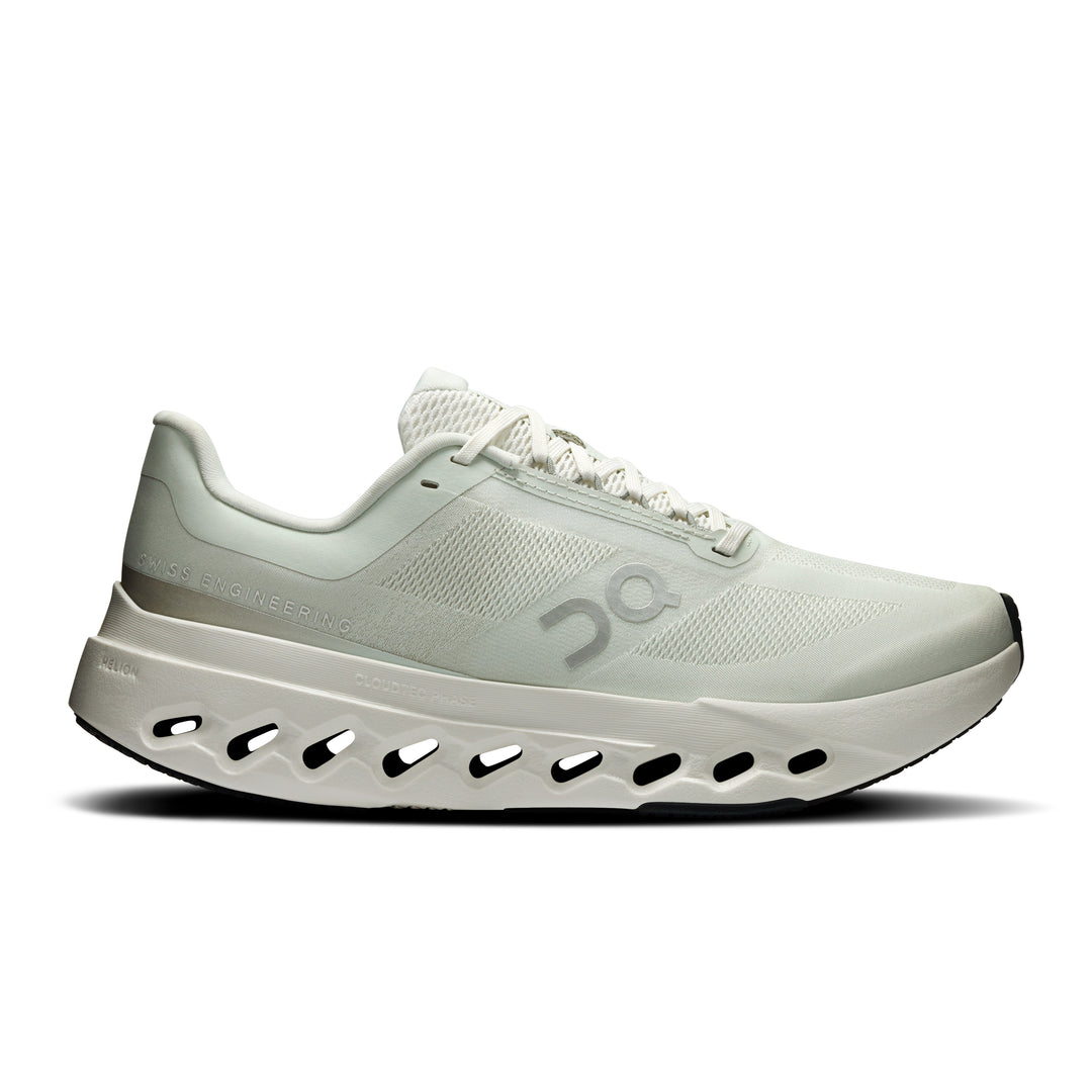 Women's On Cloudsurfer Next running shoe in off-white with a lightweight woven upper and CloudTec Phase foam sole.