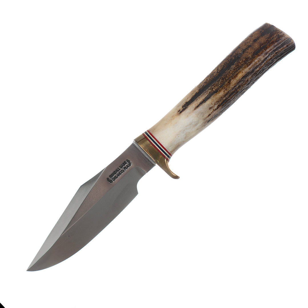 Randall Made 8-4 Trout & Bird knife with a 4-inch steel blade, brass hilt, and textured natural stag handle.