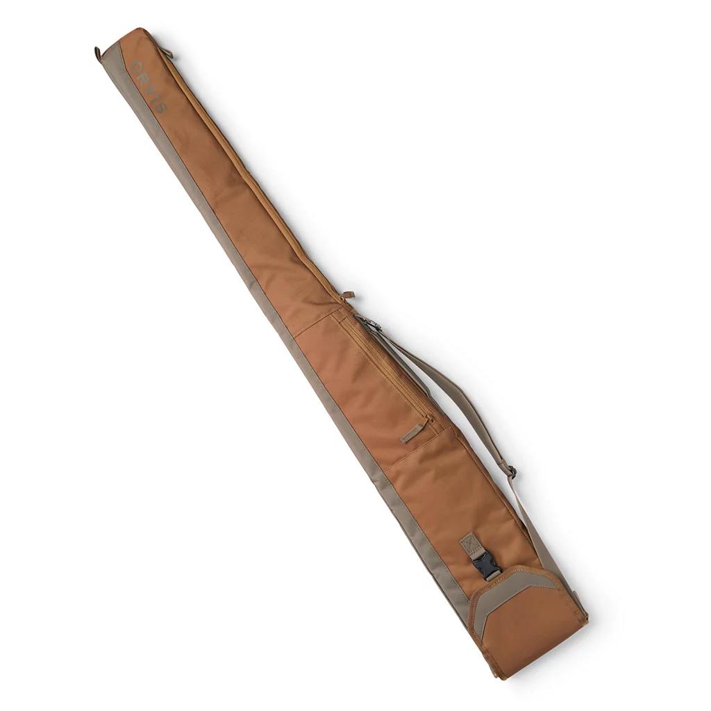 Brown Orvis upland shotgun slip in durable CORDURA polyester with a side buckle, carry handle, and shoulder strap.