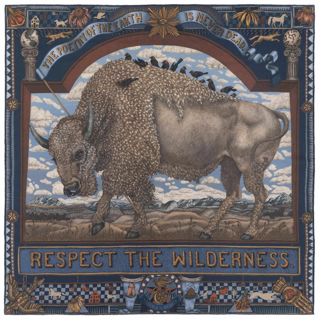Sabina Savage silk square scarf featuring a detailed bison illustration, birds, and wilderness motifs in a navy blue border.